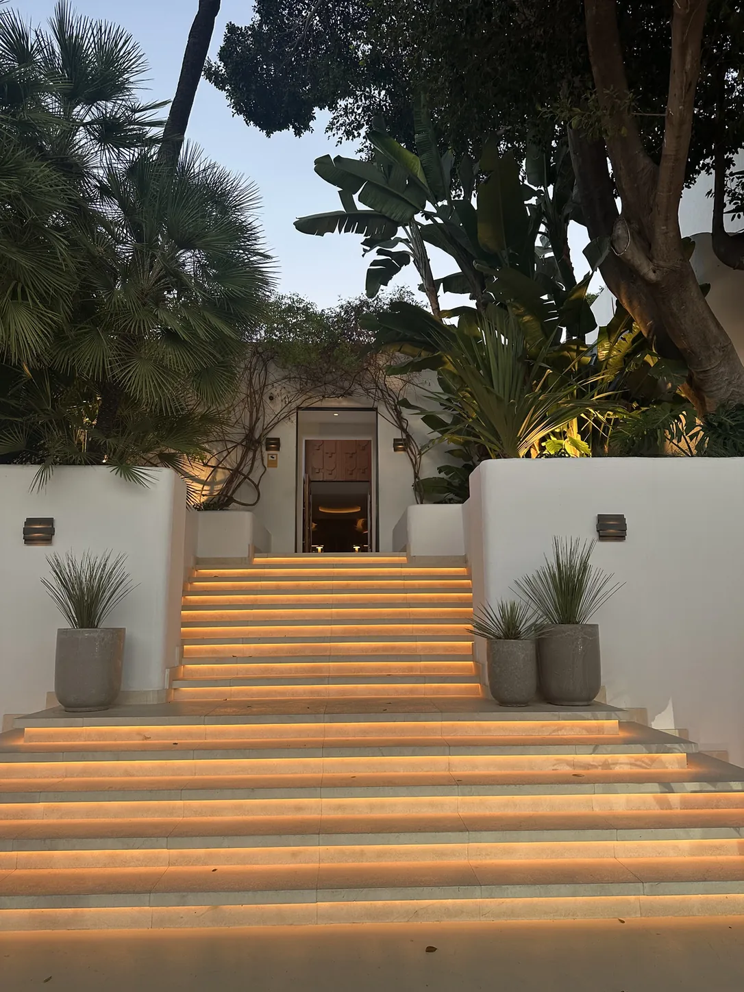 Garden stairs with warm strip lighting at dusk